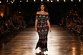 Robe noire et rouge volant tapa